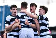 20 March 2023; Paul Dunne of Belvedere College, 12, celebrates with teammates after scoring their side's second try during the Bank of Ireland Leinster Rugby Schools Junior Cup semi-final replay match between Belvedere College and St Michael’s College at Energia Park in Dublin. Photo by Ben McShane/Sportsfile