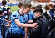 20 March 2023; Setanta McLaughlin of St Michael's College celebrates with supporters after the Bank of Ireland Leinster Rugby Schools Junior Cup semi-final replay match between Belvedere College and St Michael’s College at Energia Park in Dublin. Photo by Ben McShane/Sportsfile