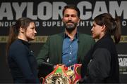 20 March 2023; Katie Taylor, left, and Chantelle Cameron face off with promoter Eddie Hearn, centre, after a media conference, held at the Mansion House in Dublin, ahead of their undisputed super lightweight championship fight on May 20th at the 3Arena in Dublin Photo by David Fitzgerald/Sportsfile