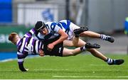 20 March 2023; Conor Quinn of Terenure College is tackled by Geoffrey Wall of Blackrock College during the Bank of Ireland Leinster Rugby Schools Junior Cup semi-final replay match between Terenure College and Blackrock College at Energia Park in Dublin. Photo by Ben McShane/Sportsfile