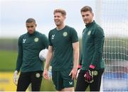 20 March 2023; Goalkeeper Mark Travers, right, with Nathan Collins and goalkeeper Gavin Bazunu, left, during a Republic of Ireland training session at the FAI National Training Centre in Abbotstown, Dublin. Photo by Stephen McCarthy/Sportsfile