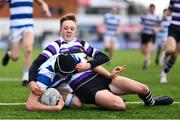 20 March 2023; Geoffrey Wall of Blackrock College scores his side's first try despite the tackle of Geoff O'Sullivan of Terenure College during the Bank of Ireland Leinster Rugby Schools Junior Cup semi-final replay match between Terenure College and Blackrock College at Energia Park in Dublin. Photo by Ben McShane/Sportsfile