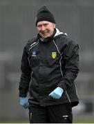 19 March 2023; Donegal team doctor Dr Kevin Moran after slipping in wet conditions during the Allianz Football League Division 1 match between Donegal and Mayo at MacCumhaill Park in Ballybofey, Donegal. Photo by Ramsey Cardy/Sportsfile