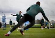 21 March 2023; Jeff Hendrick has a shot on goalkeeper Gavin Bazunu during a Republic of Ireland training session at the FAI National Training Centre in Abbotstown, Dublin. Photo by Stephen McCarthy/Sportsfile