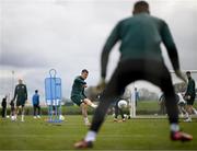 21 March 2023; Jason Knight has a shot on goalkeeper Gavin Bazunu during a Republic of Ireland training session at the FAI National Training Centre in Abbotstown, Dublin. Photo by Stephen McCarthy/Sportsfile