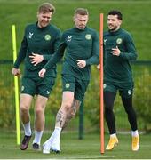 21 March 2023; Players, from left, Nathan Collins, James McClean and Mikey Johnston during a Republic of Ireland training session at the FAI National Training Centre in Abbotstown, Dublin. Photo by Stephen McCarthy/Sportsfile