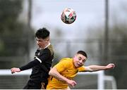 15 March 2023; Ian Fahy of Holy Rosary College in action against Sam Norval of Wexford CBS during the FAI Schools Dr Tony O'Neill Senior National Cup Final match between Holy Rosary College Mountbellew and Wexford CBS at AUL Complex in Clonshaugh, Dublin. Photo by Piaras Ó Mídheach/Sportsfile
