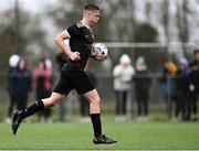 15 March 2023; Ryan Nolan of Holy Rosary College brings the ball to the centre circle after his side's first goal during the FAI Schools Dr Tony O'Neill Senior National Cup Final match between Holy Rosary College Mountbellew and Wexford CBS at AUL Complex in Clonshaugh, Dublin. Photo by Piaras Ó Mídheach/Sportsfile