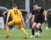 15 March 2023; Ciaran Mulhern of Holy Rosary College in action against Luc Farrell of Wexford CBS during the FAI Schools Dr Tony O'Neill Senior National Cup Final match between Holy Rosary College Mountbellew and Wexford CBS at AUL Complex in Clonshaugh, Dublin. Photo by Piaras Ó Mídheach/Sportsfile