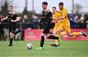 15 March 2023; Tiarnán Proulx of Holy Rosary College in action against Darragh Byrne Maloney of Wexford CBS during the FAI Schools Dr Tony O'Neill Senior National Cup Final match between Holy Rosary College Mountbellew and Wexford CBS at AUL Complex in Clonshaugh, Dublin. Photo by Piaras Ó Mídheach/Sportsfile