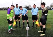 15 March 2023; Referee Niall McLaughlin alongside his linesmen Ryan Flood, left, and John Hanney with the team captains Shay O’Leary of Wexford CBS and Ronan Murphy of Holy Rosary College before the FAI Schools Dr Tony O'Neill Senior National Cup Final match between Holy Rosary College Mountbellew and Wexford CBS at AUL Complex in Clonshaugh, Dublin. Photo by Piaras Ó Mídheach/Sportsfile