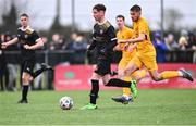 15 March 2023; Tiarnán Proulx of Holy Rosary College in action against Darragh Byrne Maloney of Wexford CBS during the FAI Schools Dr Tony O'Neill Senior National Cup Final match between Holy Rosary College Mountbellew and Wexford CBS at AUL Complex in Clonshaugh, Dublin. Photo by Piaras Ó Mídheach/Sportsfile