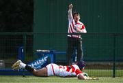 22 March 2023; Tulimafuaimahola Tupou of Japan dives over to score his side's first try as a supporter celebrates during the Under-19 Rugby International match between Ireland and Japan at Lakelands Park in Dublin. Photo by Harry Murphy/Sportsfile