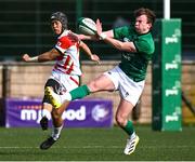 22 March 2023; Ryunosuke Ito of Japan kicks under pressure from Jack Murphy of Ireland during the Under-19 Rugby International match between Ireland and Japan at Lakelands Park in Dublin. Photo by Harry Murphy/Sportsfile
