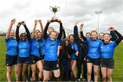22 March 2023; The Wilson Hospital captain Sinead Bowers lifts the cup as her team-mates celebrate after the Junior Final Wilson Hospital, Westmeath v Presentation Secondary School Wexford at the Leinster Rugby Girls x7s Finals Day at Cill Dara RFC in Kildare. Photo by Matt Browne/Sportsfile