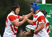 22 March 2023; Tsubasa Moriyama of Japan, right, celebrates with teammate Kenshin Shimizu after scoring his side's second try during the Under-19 Rugby International match between Ireland and Japan at Lakelands Park in Dublin. Photo by Harry Murphy/Sportsfile