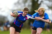 22 March 2023; Mia Curran of Presentation Secondary School Wexford in action against Wilson Hospital, Westmeath during the Junior Final Wilson Hospital, Westmeath v Presentation Secondary School Wexford at the Leinster Rugby Girls x7s Finals Day at Cill Dara RFC in Kildare. Photo by Matt Browne/Sportsfile
