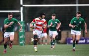22 March 2023; Shutaro Nishi of Japan makes a break during the Under-19 Rugby International match between Ireland and Japan at Lakelands Park in Dublin. Photo by Harry Murphy/Sportsfile