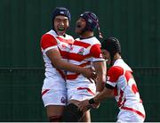 22 March 2023; Tulimafuaimahola Tupou of Japan, centre, celebrates with teammates Kotaro Okawa and Joji Takaki after scoring his side's first try during the Under-19 Rugby International match between Ireland and Japan at Lakelands Park in Dublin. Photo by Harry Murphy/Sportsfile