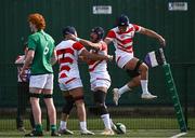 22 March 2023; Tulimafuaimahola Tupou of Japan, centre, celebrates with teammates Kotaro Okawa and Joji Takaki after scoring his side's first try during the Under-19 Rugby International match between Ireland and Japan at Lakelands Park in Dublin. Photo by Harry Murphy/Sportsfile