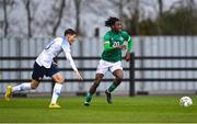 22 March 2023; Franco Umeh of Republic of Ireland in action against Tomáš Kachnic of Slovakia during the UEFA European Under-19 Championship Elite Round match between Republic of Ireland and Slovakia at Ferrycarrig Park in Wexford. Photo by Piaras Ó Mídheach/Sportsfile