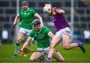 19 March 2023; Conor Boylan of Limerick in action against Rory O'Connor of Wexford during the Allianz Hurling League Division 1 Group A match between Limerick and Wexford at TUS Gaelic Grounds in Limerick. Photo by Tyler Miller/Sportsfile