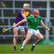 19 March 2023; Colin Coughlan of Limerick in action against Ian Carty of Wexford during the Allianz Hurling League Division 1 Group A match between Limerick and Wexford at TUS Gaelic Grounds in Limerick. Photo by Tyler Miller/Sportsfile