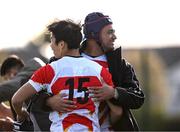 22 March 2023; Tulimafuaimahola Tupou, right, and Yoshitaka Yazaki of Japan after their side's victory in the Under-19 Rugby International match between Ireland and Japan at Lakelands Park in Dublin. Photo by Harry Murphy/Sportsfile