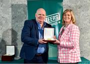 22 March 2023; Micky Fleming from Churchlands Golden gloves, Derry, receives his award from Federation of Irish Sport Chairperson Clare McGrath during the Volunteers in Sport Awards at The Crowne Plaza in Blanchardstown, Dublin. Photo by Sam Barnes/Sportsfile