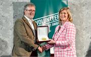 22 March 2023; Michael Cox from Park Rangers AFC, Waterford, receives his award from Federation of Irish Sport Chairperson Clare McGrath during the Volunteers in Sport Awards at The Crowne Plaza in Blanchardstown, Dublin. Photo by Sam Barnes/Sportsfile