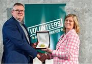 22 March 2023; Paul McGibney from Kilrush Basketball Club, Clare, receives his award from Federation of Irish Sport Chairperson Clare McGrath during the Volunteers in Sport Awards at The Crowne Plaza in Blanchardstown, Dublin. Photo by Sam Barnes/Sportsfile