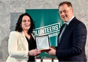 22 March 2023; Deirdre Maloney Reid from Moy Davitts GAA Club, Mayo, receives her award from Minister of State for Sport and Physical Education, Thomas Byrne TD, during the Volunteers in Sport Awards at The Crowne Plaza in Blanchardstown, Dublin. Photo by Sam Barnes/Sportsfile