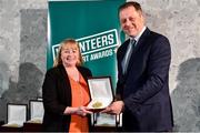 22 March 2023; Catherine Moore from Greenfields Hockey Club, Galway, receives her award from Minister of State for Sport and Physical Education, Thomas Byrne TD, during the Volunteers in Sport Awards at The Crowne Plaza in Blanchardstown, Dublin. Photo by Sam Barnes/Sportsfile