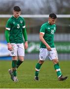 22 March 2023; Republic of Ireland players Alex Murphy, left, and Justin Ferizaj after their side's defeat in the UEFA European Under-19 Championship Elite Round match between Republic of Ireland and Slovakia at Ferrycarrig Park in Wexford. Photo by Piaras Ó Mídheach/Sportsfile
