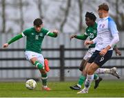 22 March 2023; Kevin Zefi of Republic of Ireland takes a shot, as teammate Franco Umeh and Adam Griger of Slovakia look on, during the UEFA European Under-19 Championship Elite Round match between Republic of Ireland and Slovakia at Ferrycarrig Park in Wexford. Photo by Piaras Ó Mídheach/Sportsfile