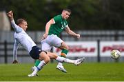 22 March 2023; Adam Griger of Slovakia in action against Sean Grehan of Republic of Ireland during the UEFA European Under-19 Championship Elite Round match between Republic of Ireland and Slovakia at Ferrycarrig Park in Wexford. Photo by Piaras Ó Mídheach/Sportsfile