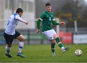 22 March 2023; Alex Murphy of Republic of Ireland in action against Viktor Úradník of Slovakia during the UEFA European Under-19 Championship Elite Round match between Republic of Ireland and Slovakia at Ferrycarrig Park in Wexford. Photo by Piaras Ó Mídheach/Sportsfile