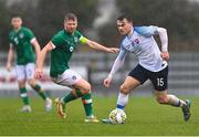 22 March 2023; Viktor Úradník of Slovakia in action against Edward McJannet of Republic of Ireland during the UEFA European Under-19 Championship Elite Round match between Republic of Ireland and Slovakia at Ferrycarrig Park in Wexford. Photo by Piaras Ó Mídheach/Sportsfile