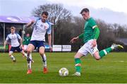 22 March 2023; Oisin Gallagher of Republic of Ireland in action against Dávid Ovšonka of Slovakia during the UEFA European Under-19 Championship Elite Round match between Republic of Ireland and Slovakia at Ferrycarrig Park in Wexford. Photo by Piaras Ó Mídheach/Sportsfile