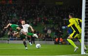 22 March 2023; Callum O’Dowda of Republic of Ireland scores his side's first goal past Pavels Steinbors of Latvia during the international friendly match between Republic of Ireland and Latvia at the Aviva Stadium in Dublin. Photo by Seb Daly/Sportsfile