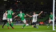22 March 2023; Evan Ferguson of Republic of Ireland scores his side's second goal during the international friendly match between Republic of Ireland and Latvia at the Aviva Stadium in Dublin. Photo by Seb Daly/Sportsfile