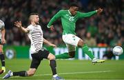 22 March 2023; Chiedozie Ogbene of Republic of Ireland shoots to score his side's third goal during the international friendly match between Republic of Ireland and Latvia at Aviva Stadium in Dublin. Photo by Stephen McCarthy/Sportsfile
