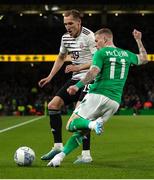 22 March 2023; James McClean of Republic of Ireland in action against Raimonds Krollis of Latvia during the international friendly match between Republic of Ireland and Latvia at Aviva Stadium in Dublin. Photo by Michael P Ryan/Sportsfile
