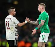 22 March 2023; James McClean of Republic of Ireland shakes hands with Roberts Savalnieks of Latvia after the international friendly match between Republic of Ireland and Latvia at Aviva Stadium in Dublin. Photo by Michael P Ryan/Sportsfile