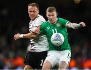 22 March 2023; James McClean of Republic of Ireland in action against Alvis Jaunzems of Latvia during the international friendly match between Republic of Ireland and Latvia at Aviva Stadium in Dublin. Photo by Michael P Ryan/Sportsfile