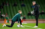 22 March 2023; Republic of Ireland goalkeeping coach Dean Kiely, right, and goalkeeper Caoimhin Kelleher before the international friendly match between Republic of Ireland and Latvia at the Aviva Stadium in Dublin. Photo by Seb Daly/Sportsfile