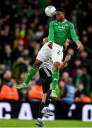 22 March 2023; Chiedozie Ogbene of Republic of Ireland in action against Antonis Cernomordis of Latvia during the international friendly match between Republic of Ireland and Latvia at Aviva Stadium in Dublin. Photo by Brendan Moran/Sportsfile