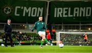 22 March 2023; Republic of Ireland manager Stephen Kenny looks on as Matt Doherty warms up before the international friendly match between Republic of Ireland and Latvia at Aviva Stadium in Dublin. Photo by Brendan Moran/Sportsfile
