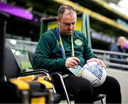 22 March 2023; Alan Garnett tests the pressure of the match footballs before the international friendly match between Republic of Ireland and Latvia at Aviva Stadium in Dublin. Photo by Stephen McCarthy/Sportsfile