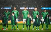 22 March 2023; Republic of Ireland players and mascots during the international friendly match between Republic of Ireland and Latvia at Aviva Stadium in Dublin. Photo by Stephen McCarthy/Sportsfile